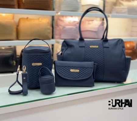 بكيج شنطة كتف جلد مع عدة قطع